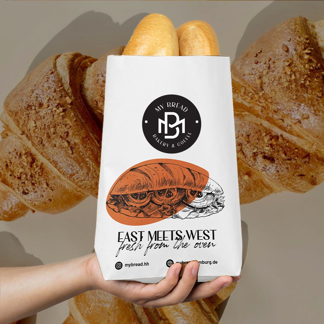 Die My-Bread-Papiertüte mit dem Aufdruck East meets West, fresh from the oven